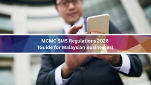 A businessman using mobile phone reading MCMC SMS regulations